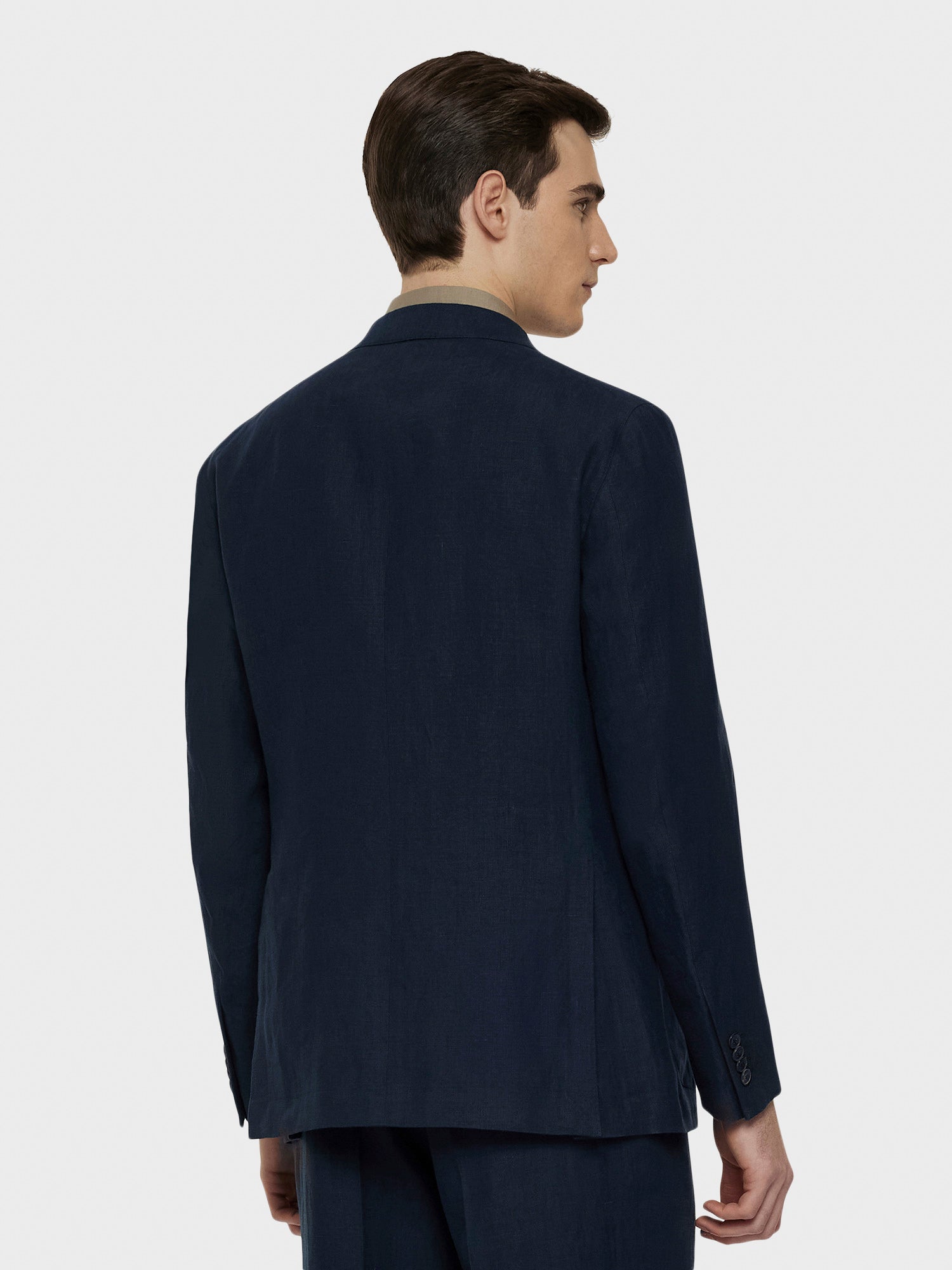 Caruso Menswear Abbigliamento Uomo Giacca aida doppiopetto in lino blu indossato back
