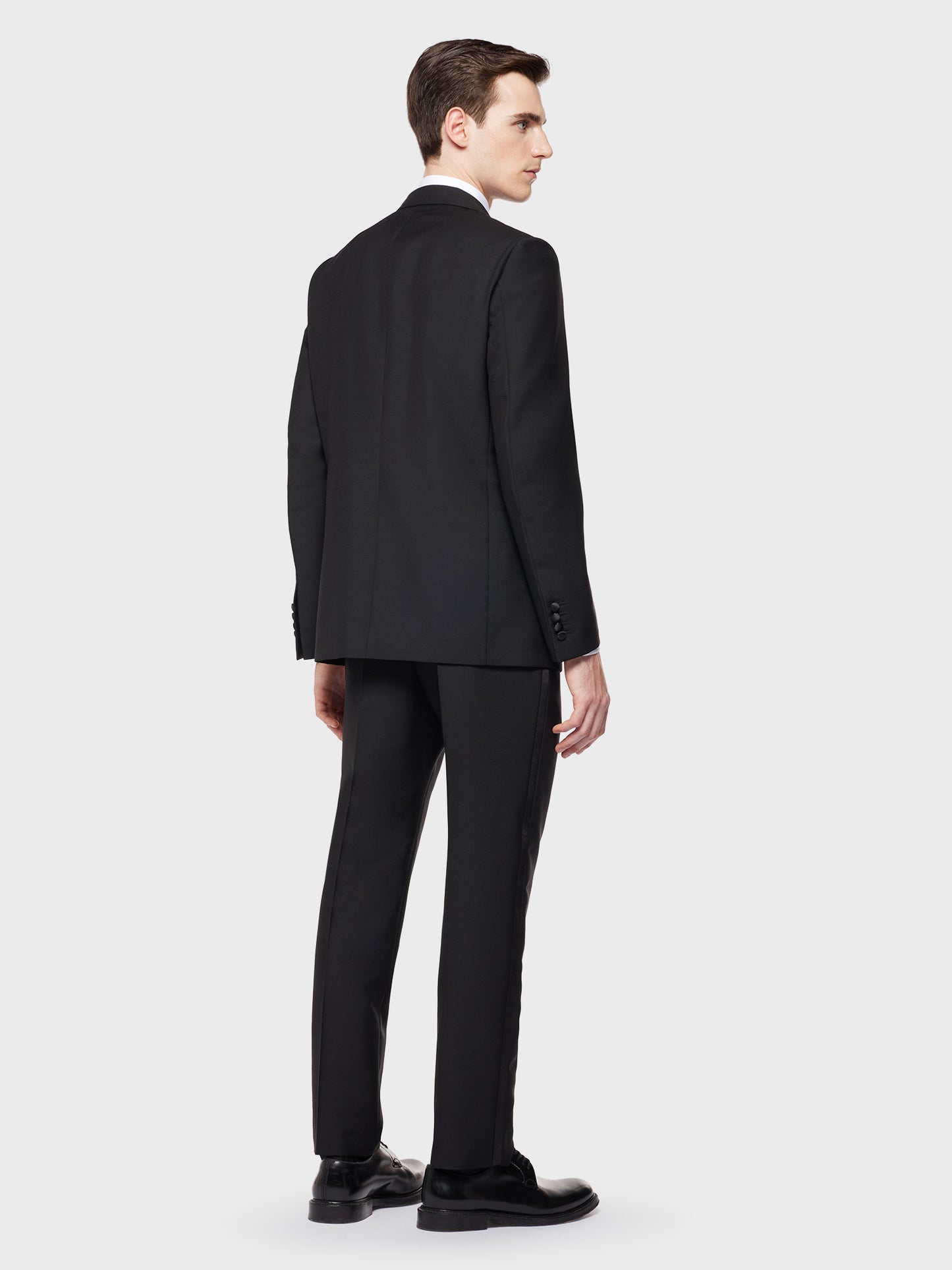 Caruso Menswear Abbigliamento Uomo Abito smoking norma in lana mohair nero indossato