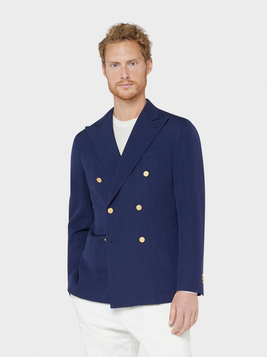 Caruso Menswear Abbigliamento Uomo Giacca Aida doppiopetto semisfoderata con rever a lancia in lana blu drop 8R indossato