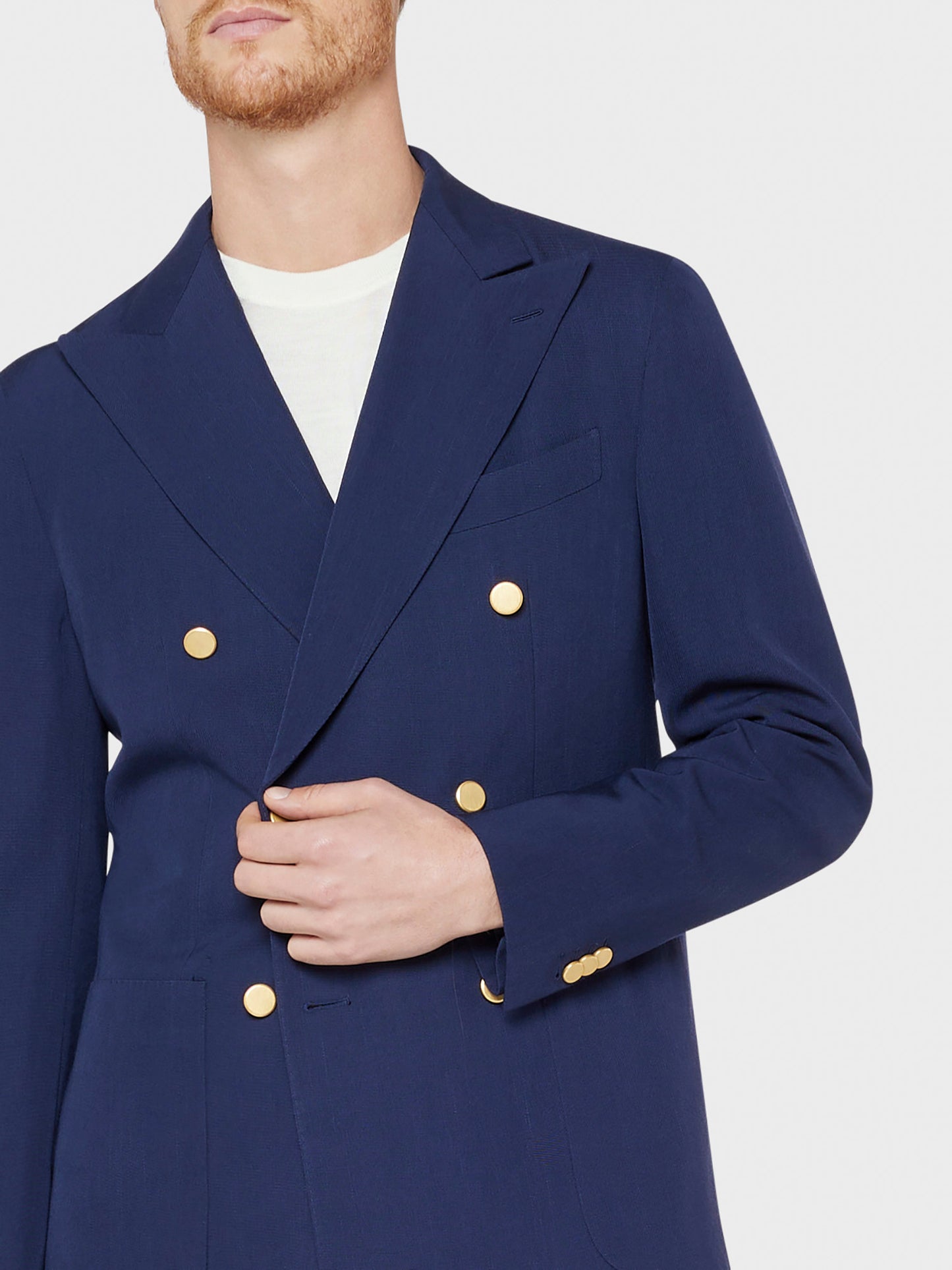 Caruso Menswear Abbigliamento Uomo Giacca Aida doppiopetto semisfoderata con rever a lancia in lana blu drop 8R dettaglio