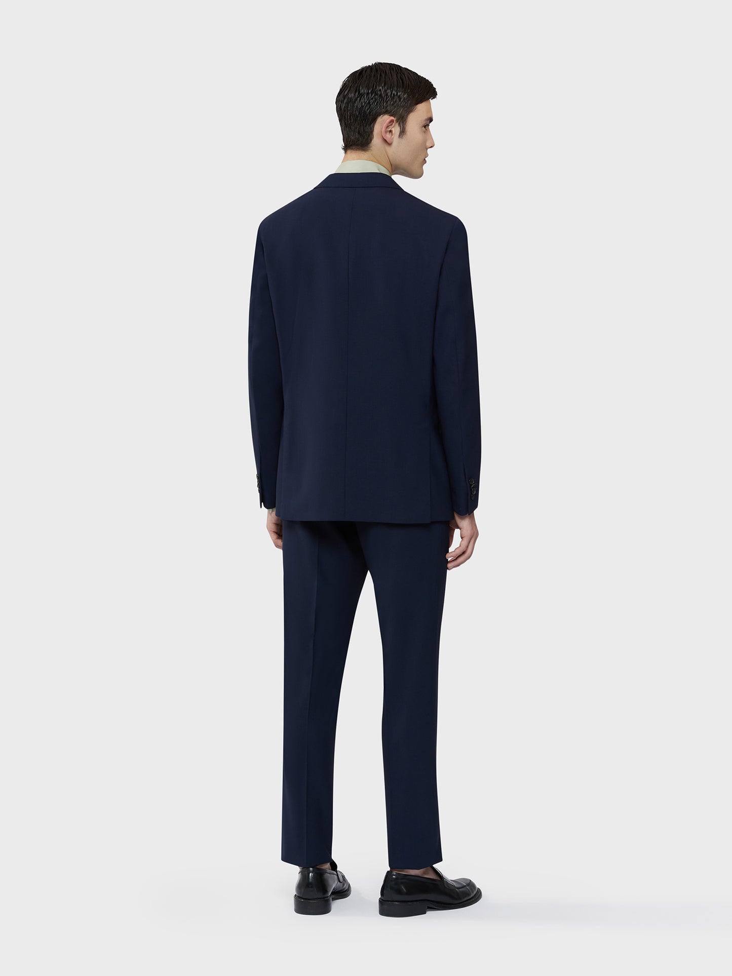 Caruso Menswear Abbigliamento Uomo Abito Norma in tropical di lana blu "Houdini" drop 7R indossato back