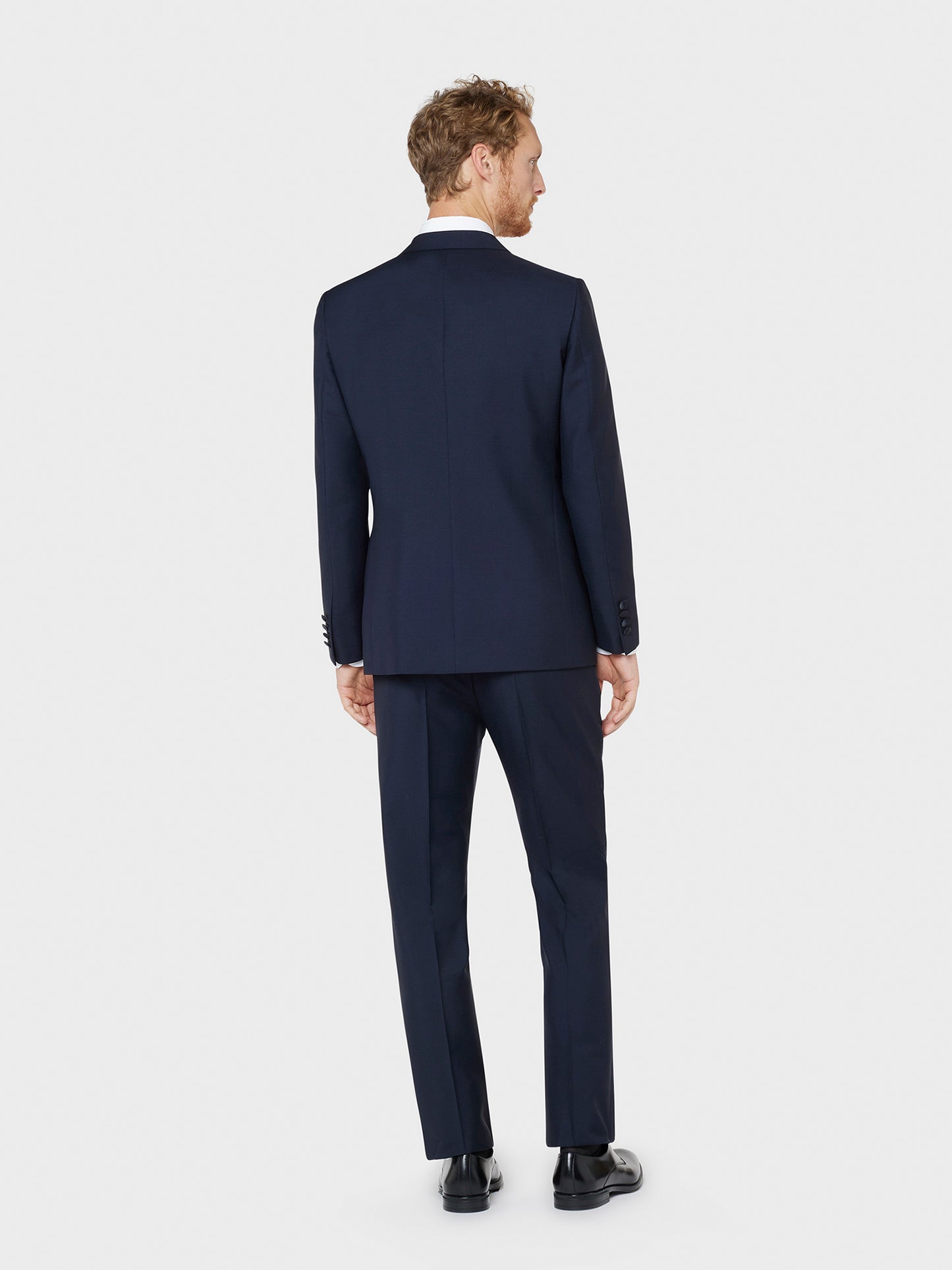 Caruso Menswear Abbigliamento Uomo Abito Smoking Norma in tela di lana e mohair in blu drop 7R indossato back